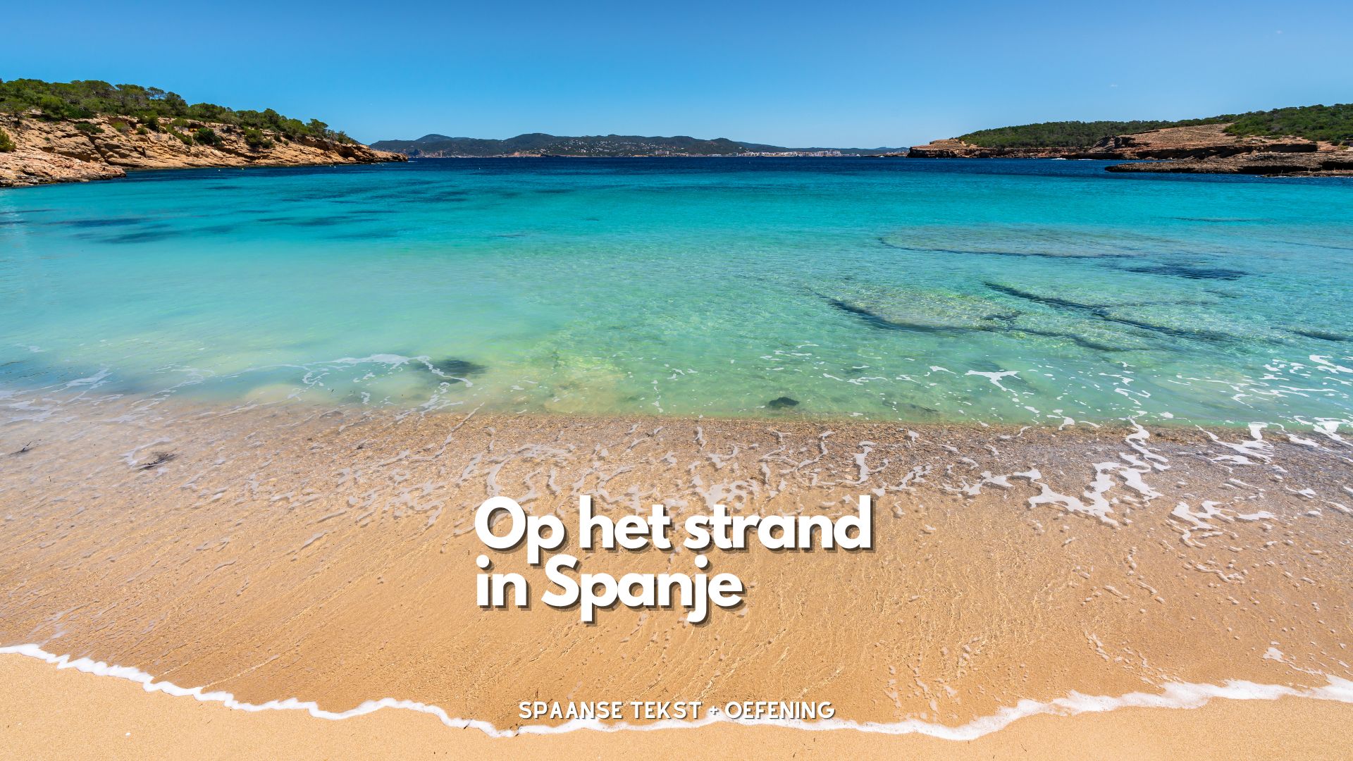 Op het strand in Spanje